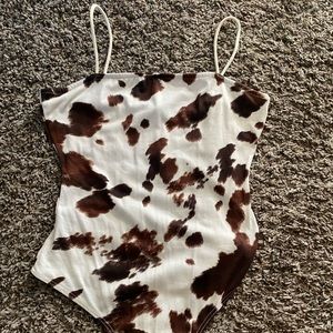 Cow print body suit